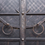 wrought iron doors. with circular handle